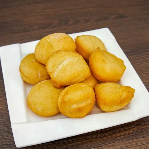 Sugar-dusted Portuguese doughnuts at Moku Hawaiian BBQ, a Hawaiian Restaurant in San Pablo