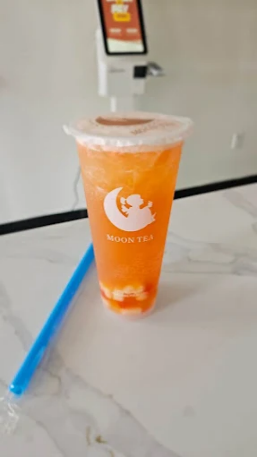 Passion Fruit & Jasmine Fruit Tea at Moon Poke, Sushi & Sweets, a bubble tea shop in East Stroudsburg