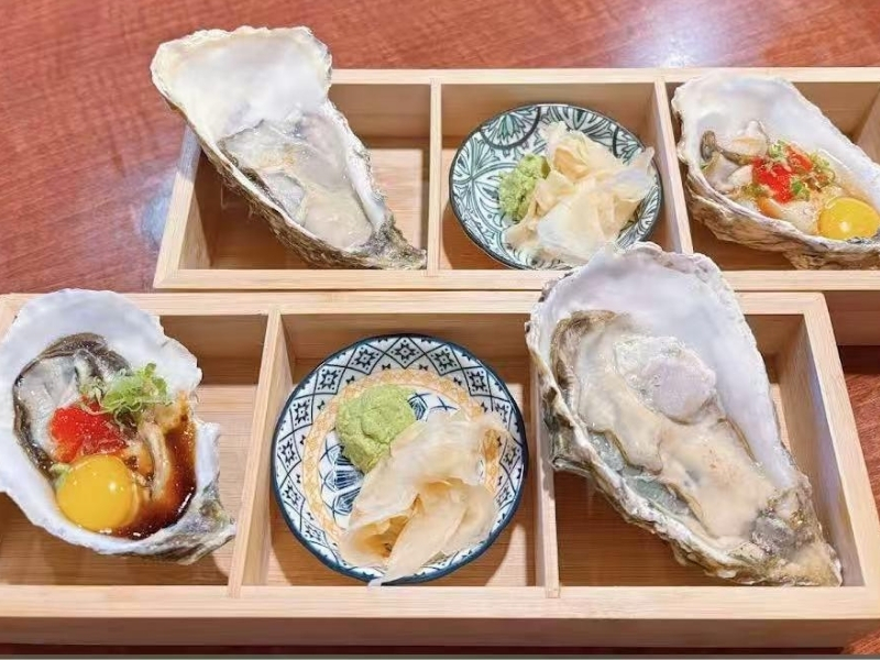 Assorted oysters with toppings at Mori Sushi, a Japanese Restaurant in Indianapolis