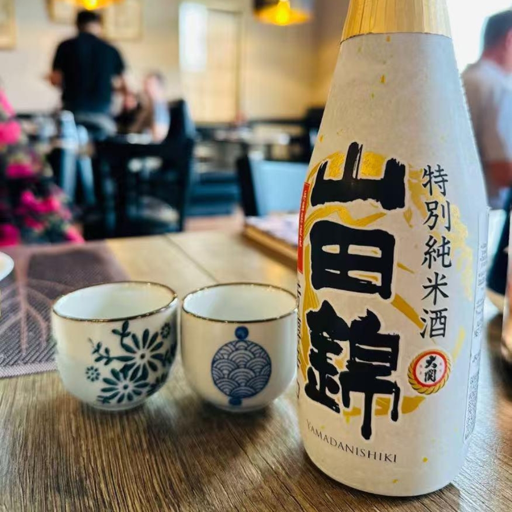 Yamadanishiki sake with cups at Mori Sushi, a Japanese Restaurant in Indianapolis