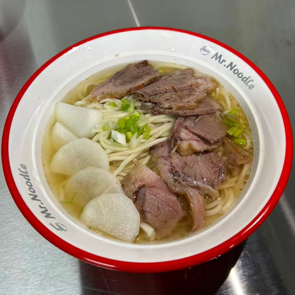 Clear beef noodle soup with radish at Mr.Noodle, an Chinese Restaurant in Corona
