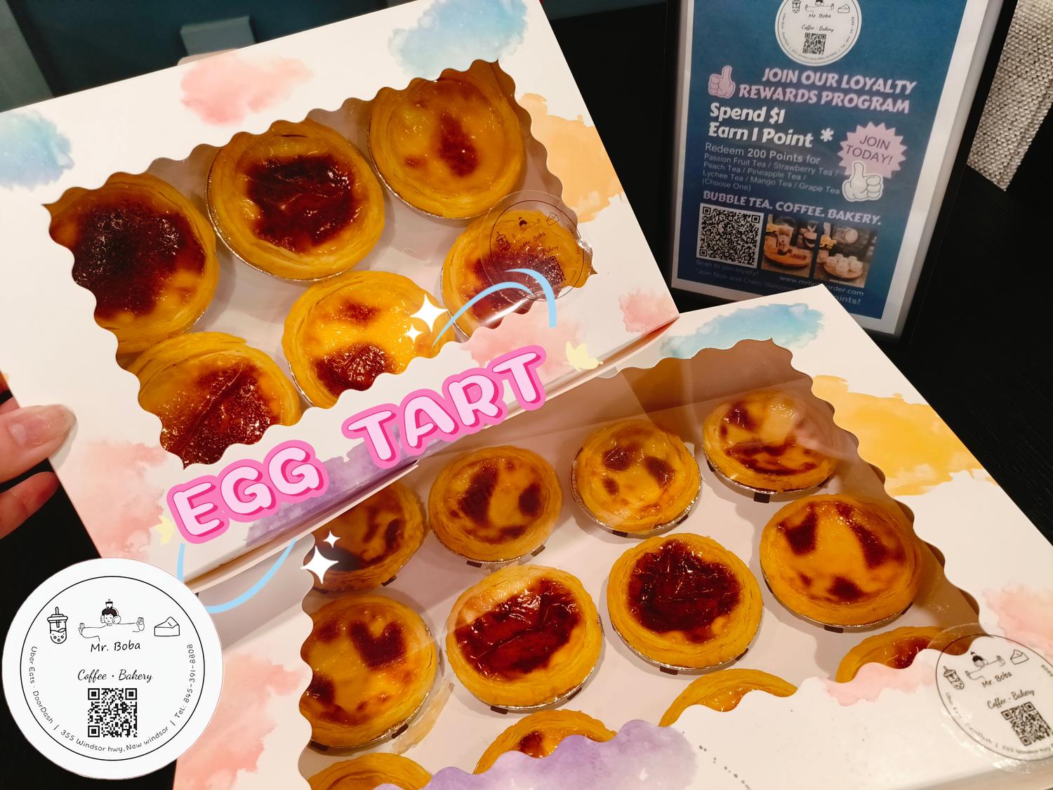 Mr-Boba-Dessert-shop-2-boxes-of-EGG-TART-New-Windsor Box of egg tarts, golden and freshly baked.