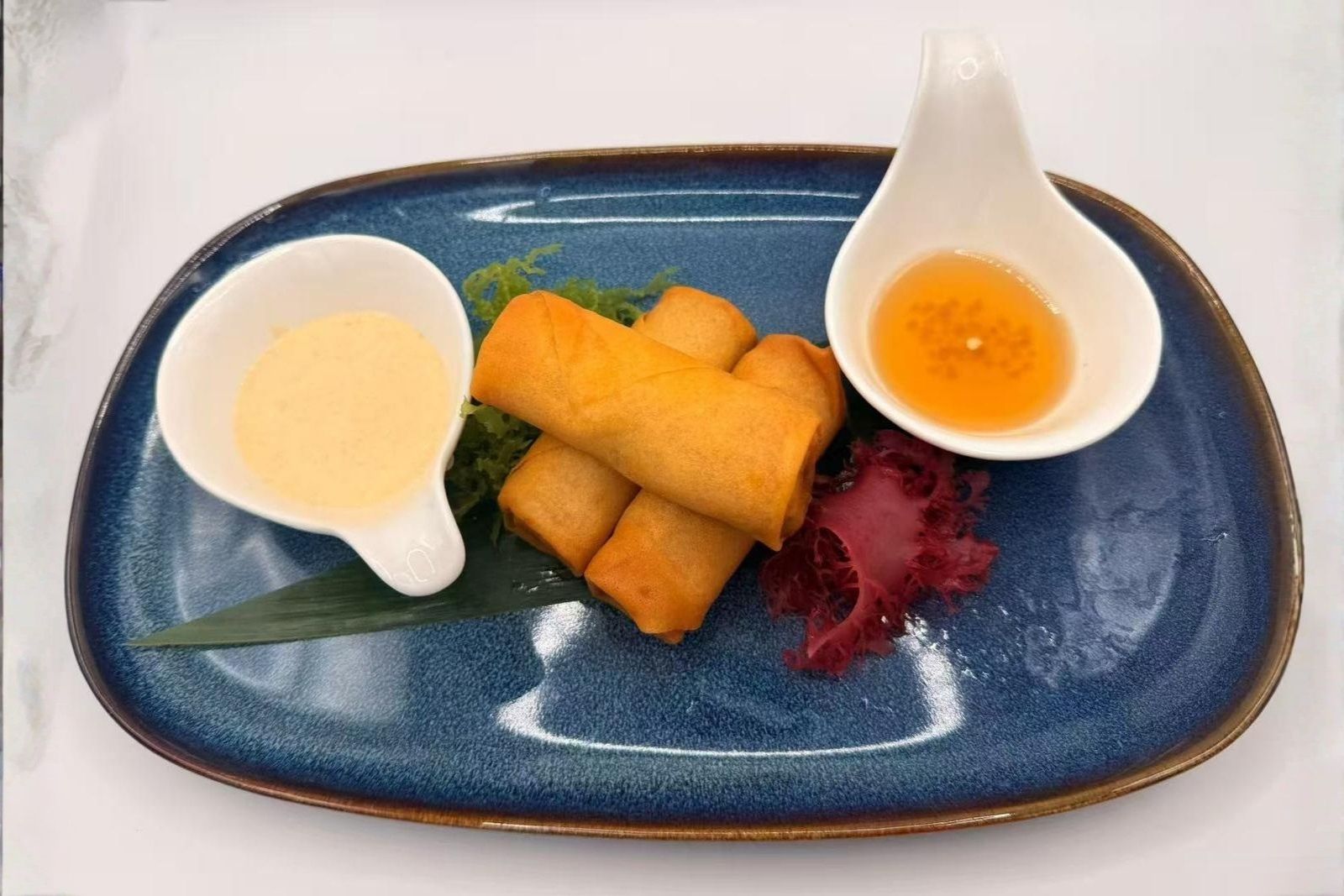 Crispy spring rolls served with two dipping sauces at Mr Boba Kitchen , a Asian Fusion Restaurant in New Windsor