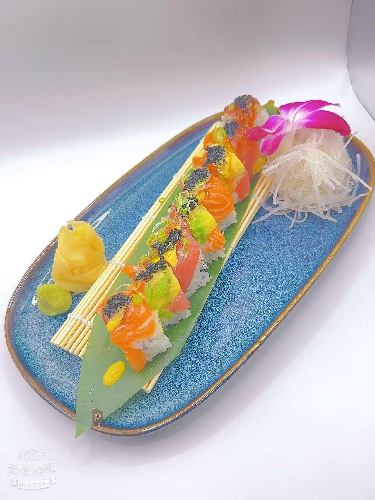 Shrimp-stuffed sushi roll with drizzled sauce at Mr Boba Kitchen , a Asian Fusion Restaurant in New Windsor