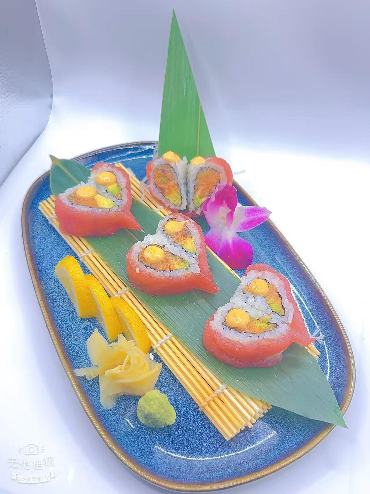 Heart-shaped salmon sushi rolls with fillings & garnish at Mr Boba Kitchen , a Asian Fusion Restaurant in New Windsor