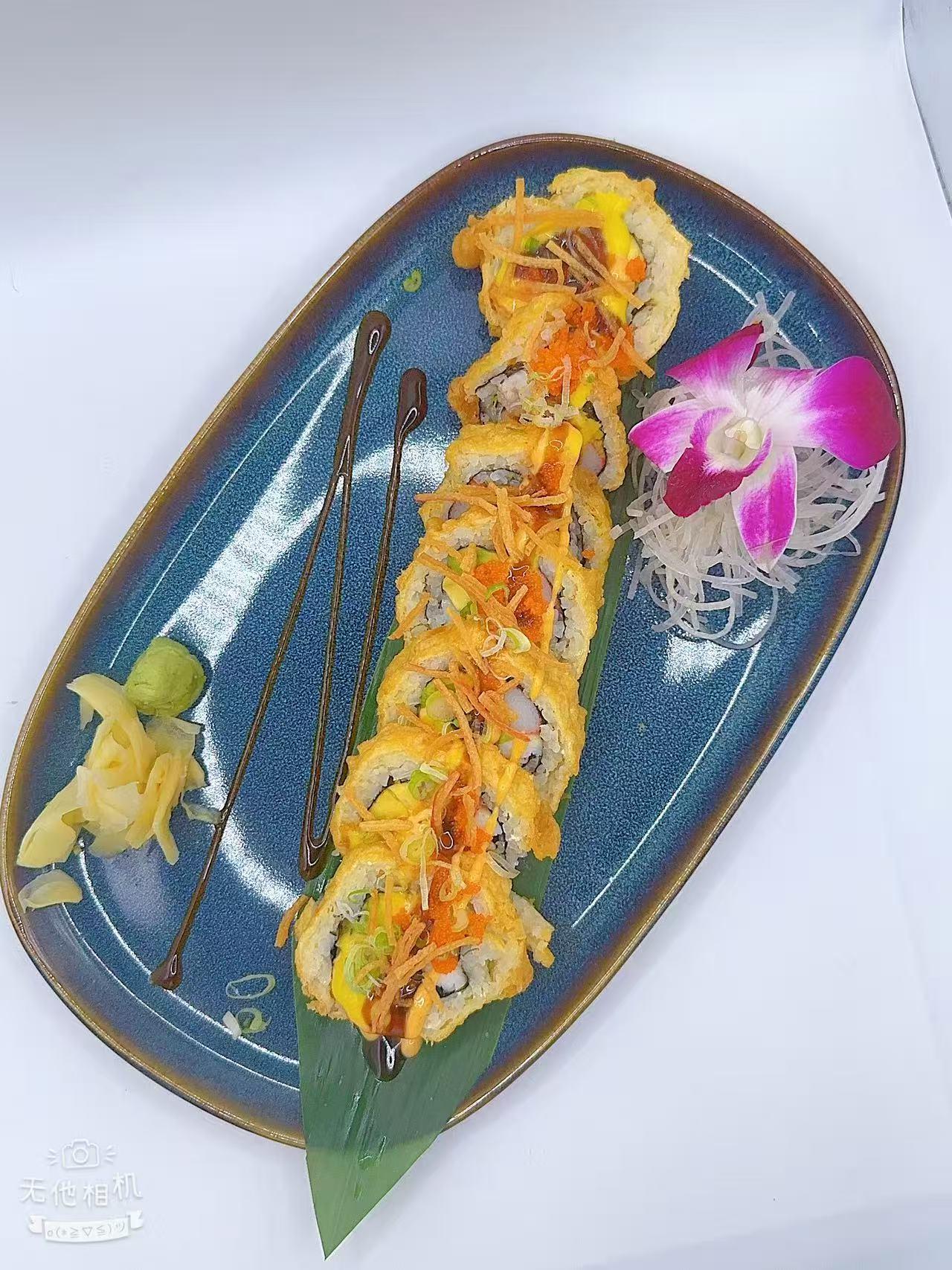 Crispy sushi roll topped with shreds & sauce at Mr Boba Kitchen , a Asian Fusion Restaurant in New Windsor