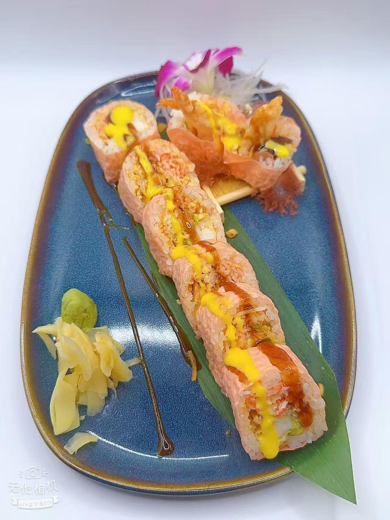 Shrimp-stuffed sushi roll with drizzled sauce at Mr Boba Kitchen , a Asian Fusion Restaurant in New Windsor