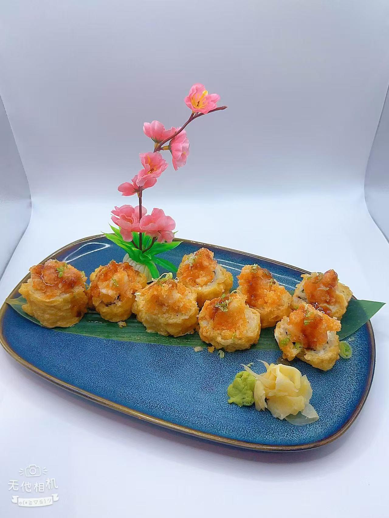 Crispy sushi roll topped with shreds & sauce at Mr Boba Kitchen , a Asian Fusion Restaurant in New Windsor