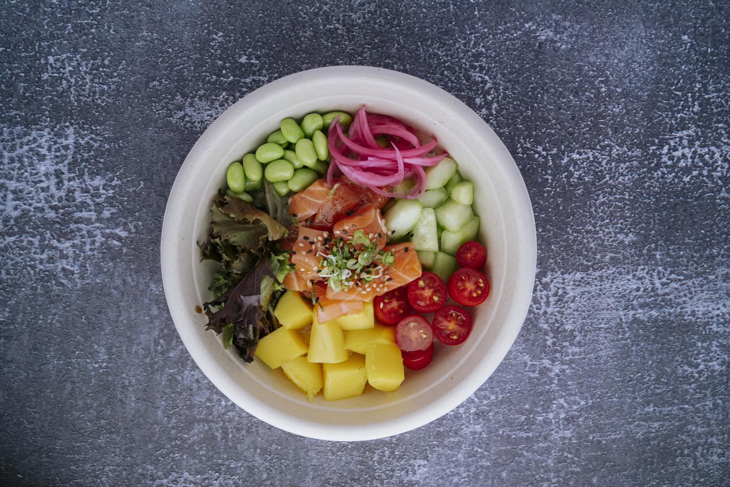 Salmon poke bowl with mango at Mr Farmer, a Asian Fusion Restaurant in St. Augustine