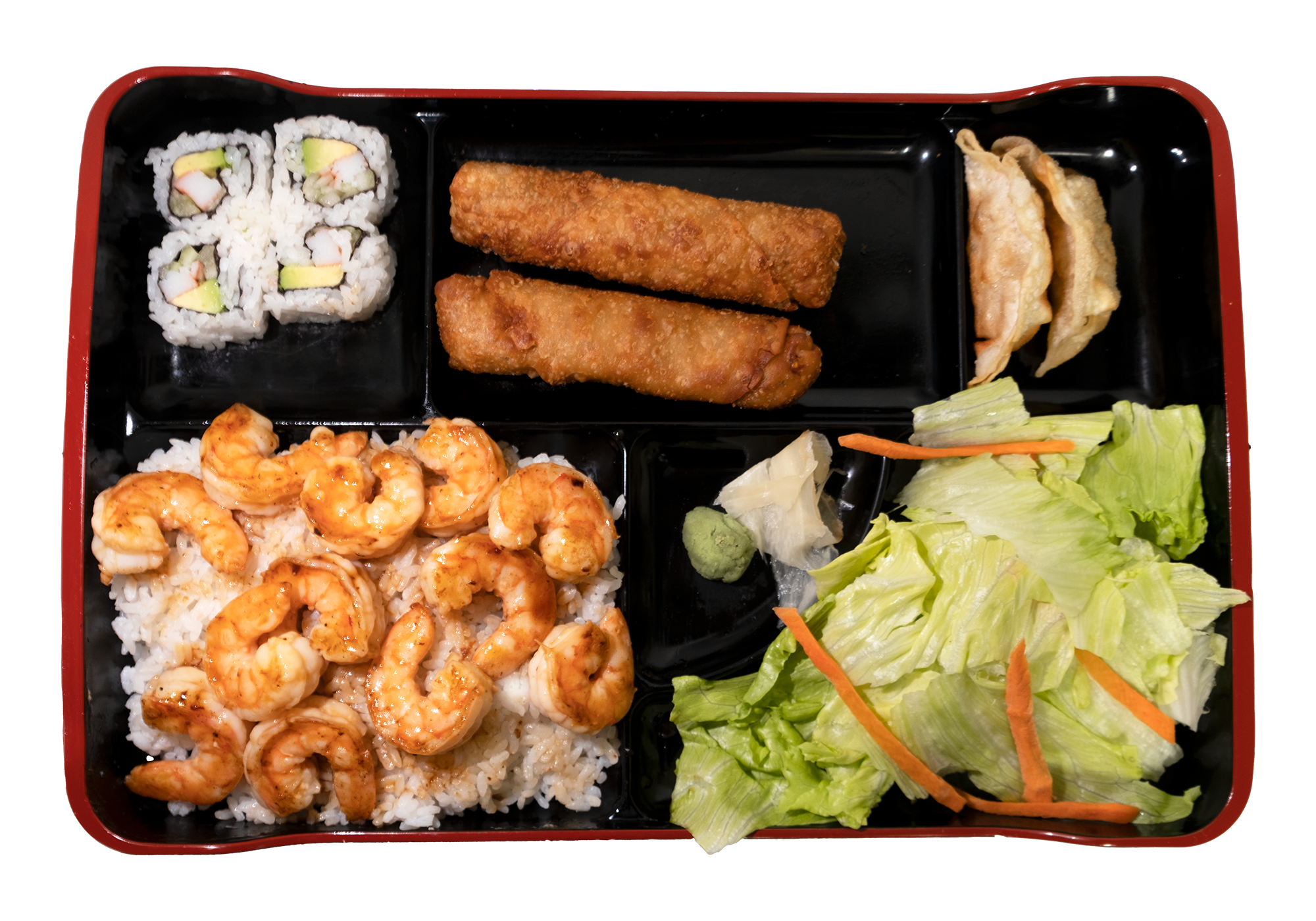 Multi-compartment bento box with shrimp rice, maki rolls, egg rolls, dumplings and fresh salad at Mr. Teriyaki, a Asian Restaurant in San Antonio