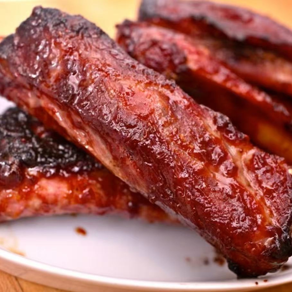 Tender grilled BBQ ribs with a glossy sauce at Mr Zhang Kitchen, a Asian restaurant in River Edge