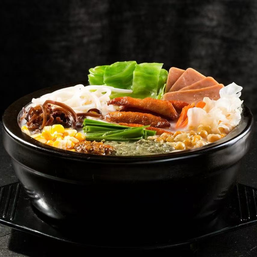 Mr-Zhang-Kitchen-Asian-Restaurant-Vermicelli-Soup-with-Mixed-Ingredients-River-Edge Vermicelli soup with an assortment of ingredients including lettuce, ham, and chicken feet at Mr Zhang Kitchen, a Asian restaurant in River Edge