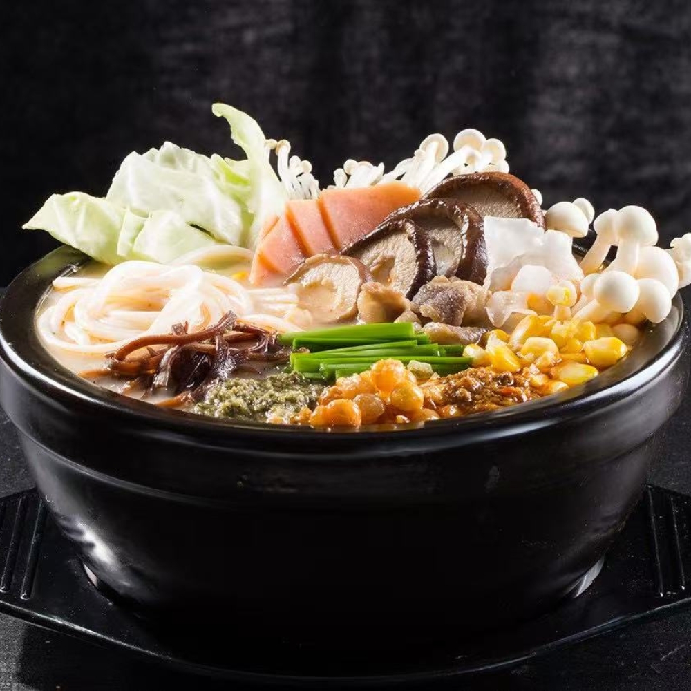 Mr-Zhang-Kitchen-Asian-Restaurant-Vermicelli-in-Multi-ingredient-Soup-River-Edge A bowl of vermicelli soup with various ingredients like vegetables, mushrooms, and ham at Mr Zhang Kitchen, a Asian restaurant in River Edge