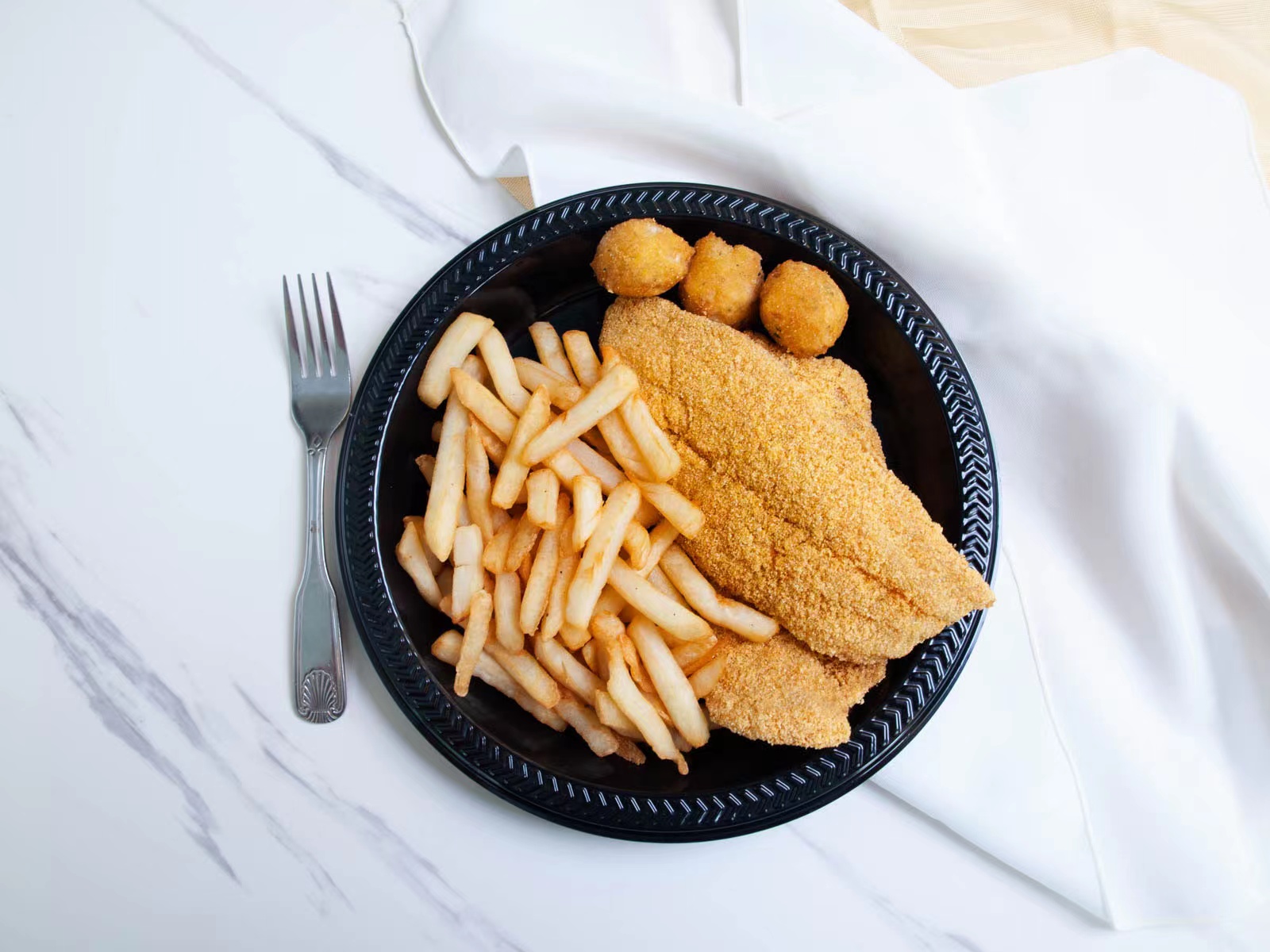 Breaded fried fish fillets with fries at M TOWN WING, a Chicken Wings Restaurant in Middletown