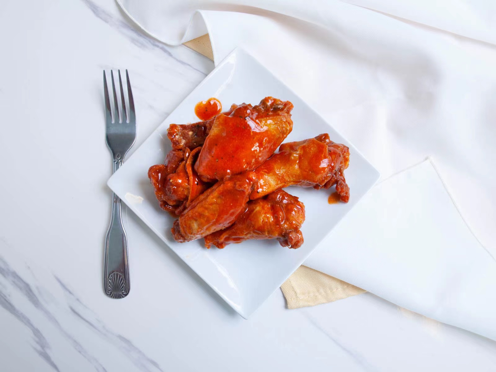 Glazed spicy buffalo chicken wings at M TOWN WING, a Chicken Wings Restaurant in Middletown