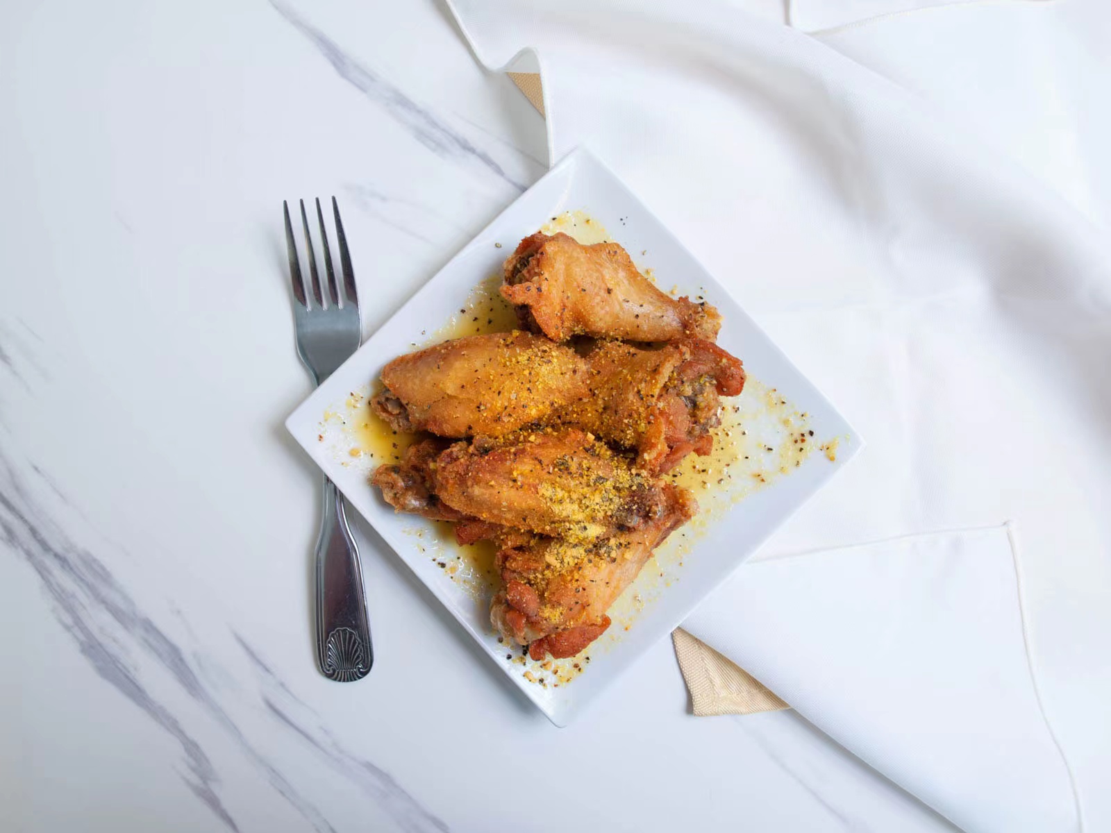 Seasoned lemon pepper baked chicken wings at M TOWN WING, a Chicken Wings Restaurant in Middletown