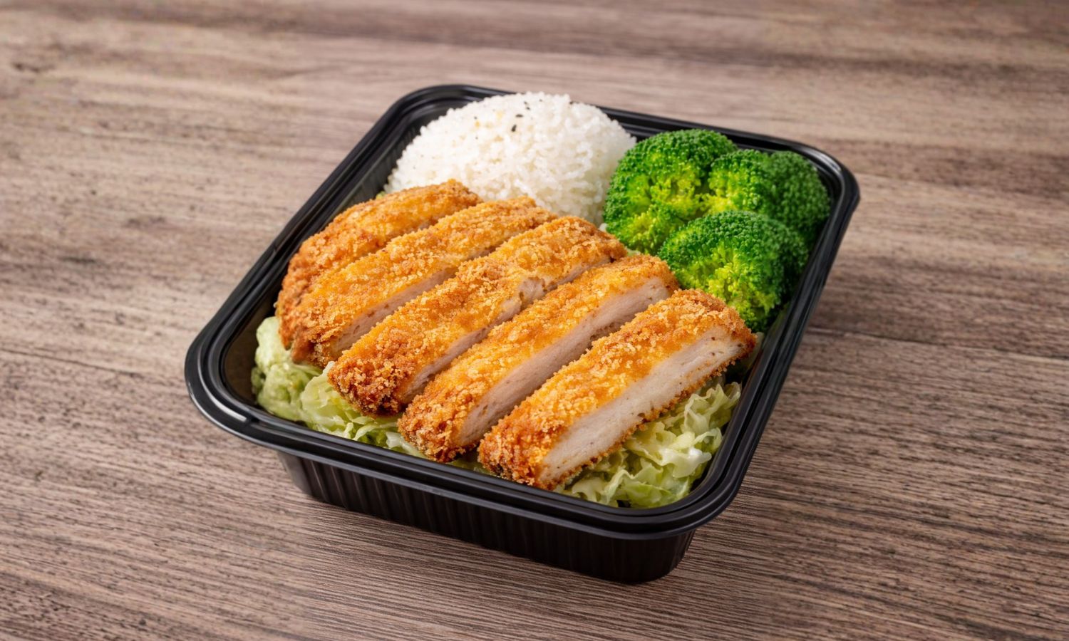 Crispy fried chicken katsu with rice and broccoli at Muy Bien Teriyaki, a Japanese Restaurant in El Monte
