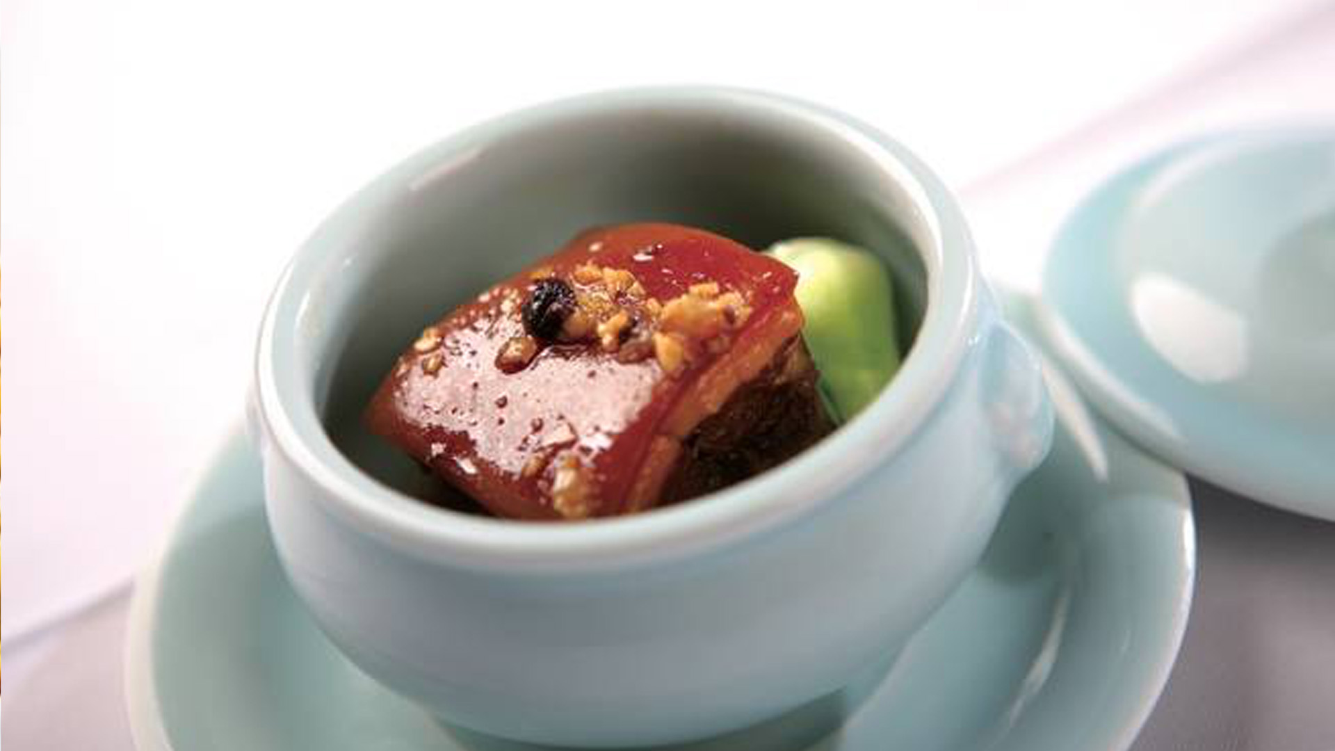 Classic Dongpo pork in a ceramic bowl