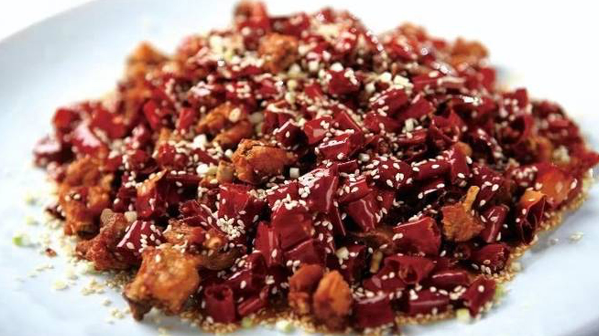 Spicy chicken with dried red chilies and sesame seeds