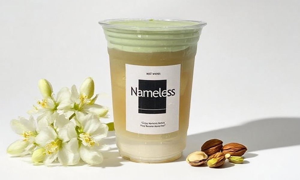 Beverage with pistachio creama, jasmine flowers and pistachios at Nameless Tea&Coffee, a Coffee Shop in Sacramento