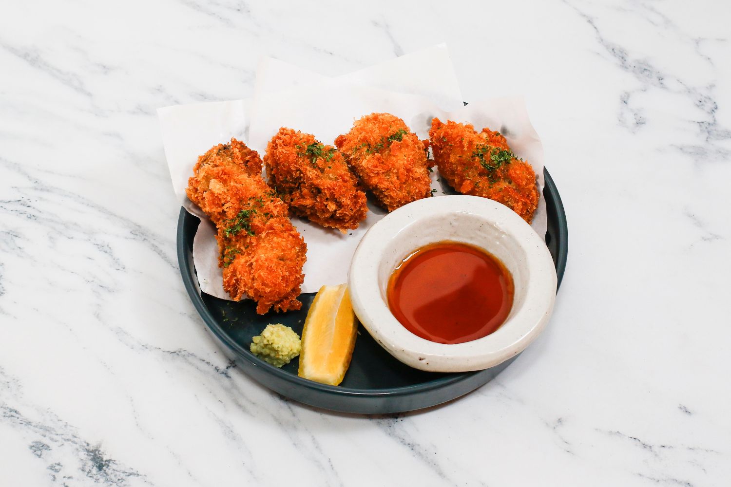 Korean-style fried chicken and sauce at Namu Modern Korean Cuisine Restaurant in Huntsville