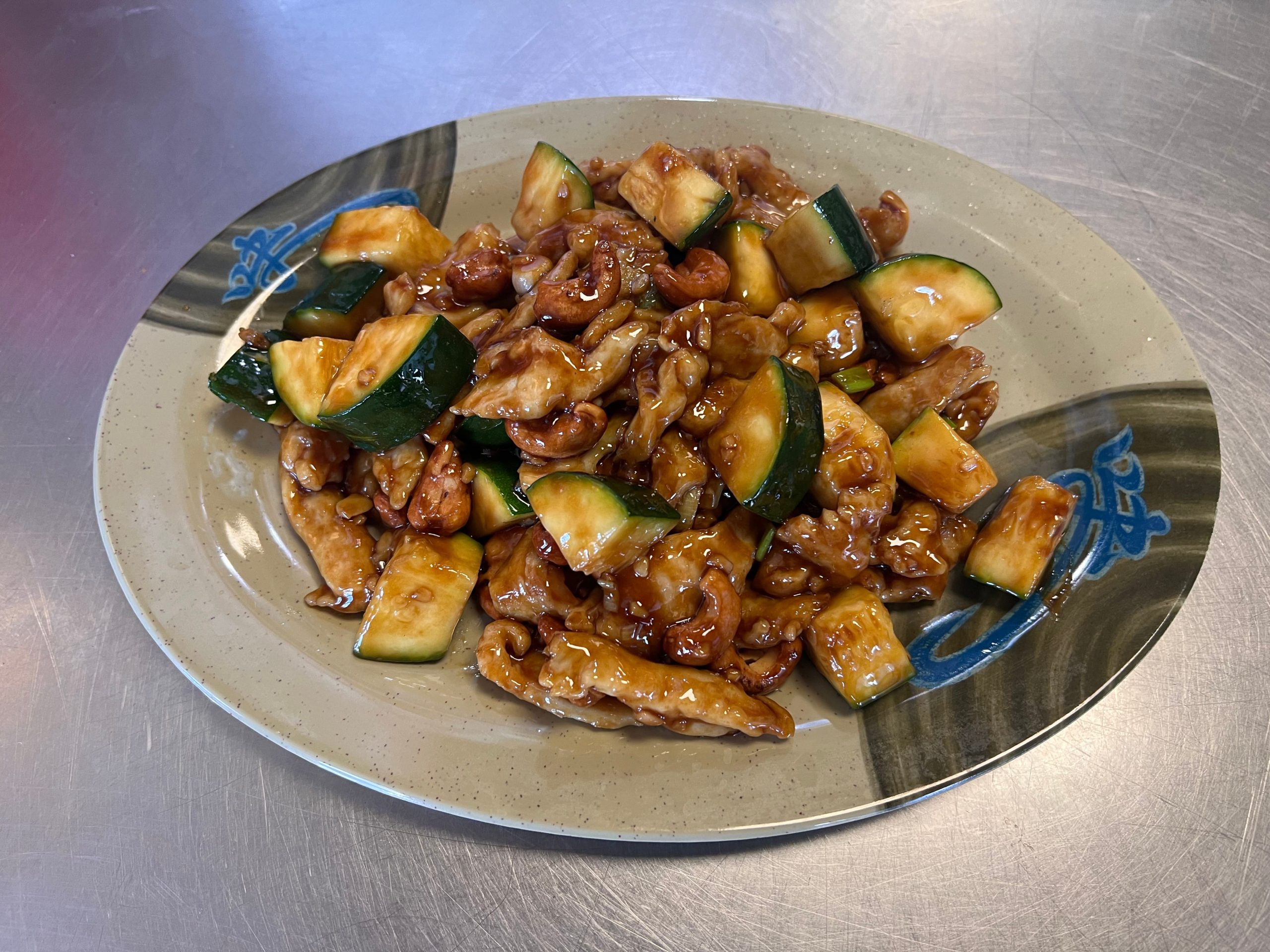 Kung Pao chicken with peanuts and zucchini at Neighborhood Kitchen, a Chinese Restaurant in Fairfield