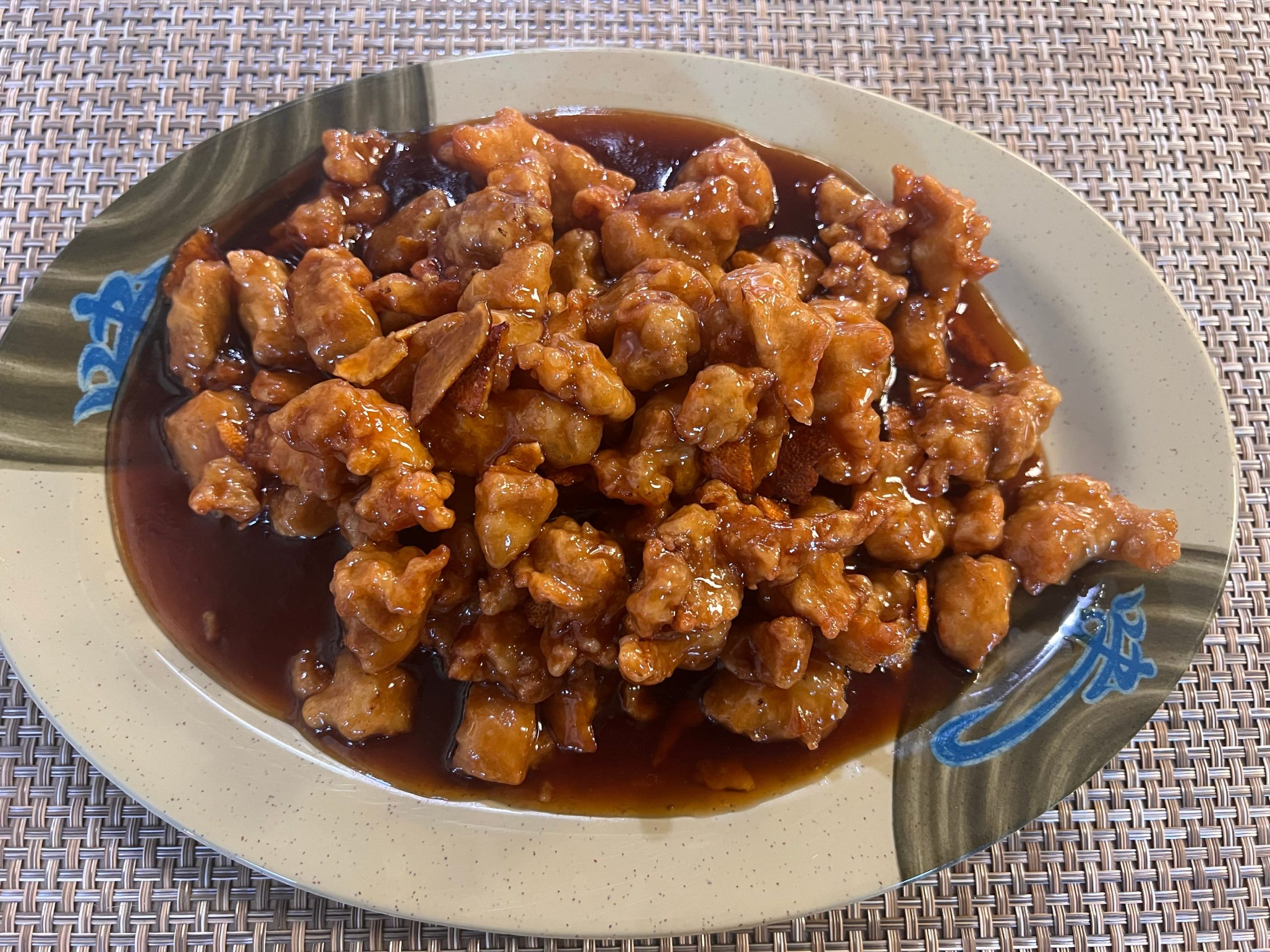 Orange chicken in sweet sauce at Neighborhood Kitchen, a Chinese Restaurant in Fairfield