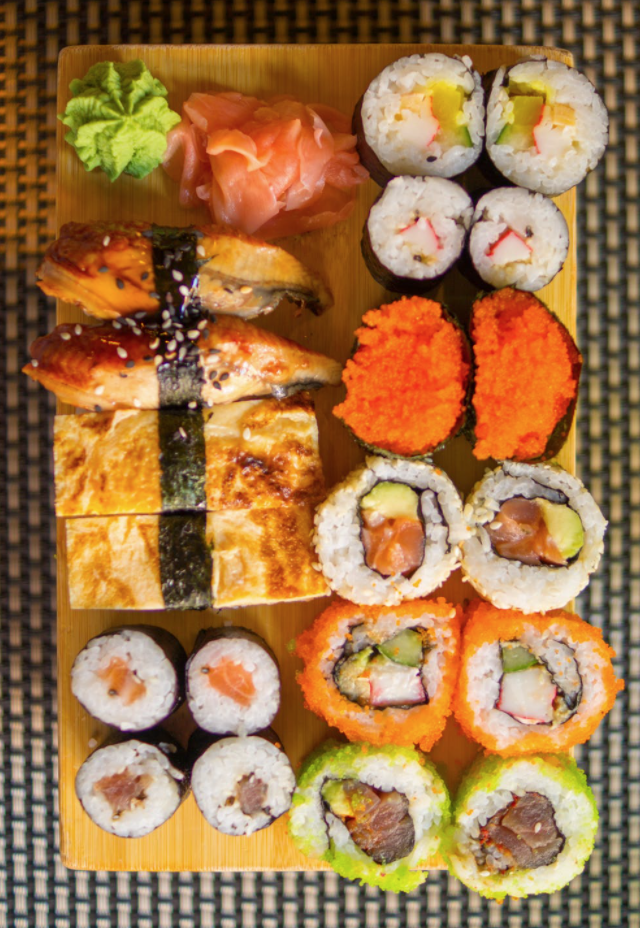 A rich and assorted sushi platter, including different types of sushi
