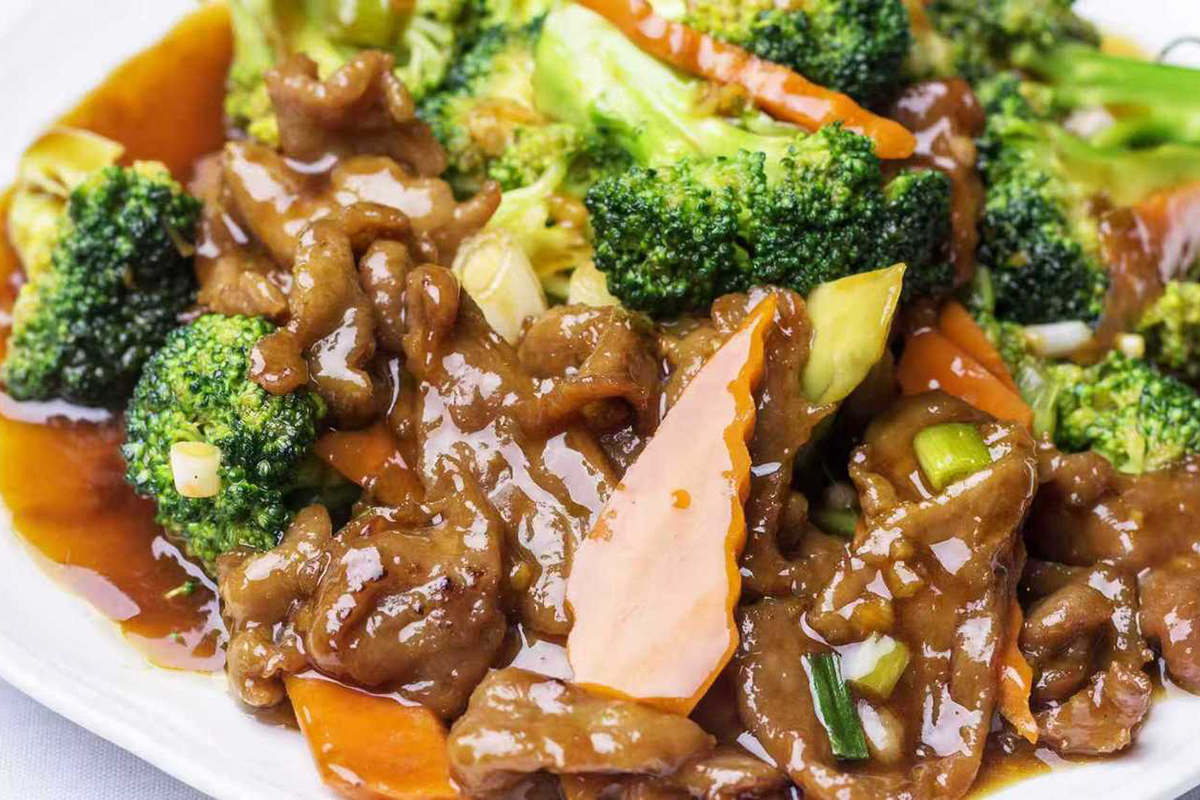 Beef and broccoli stir-fry with carrots in a glossy brown sauce at New China Two，a Chinese Restaurant in Redding