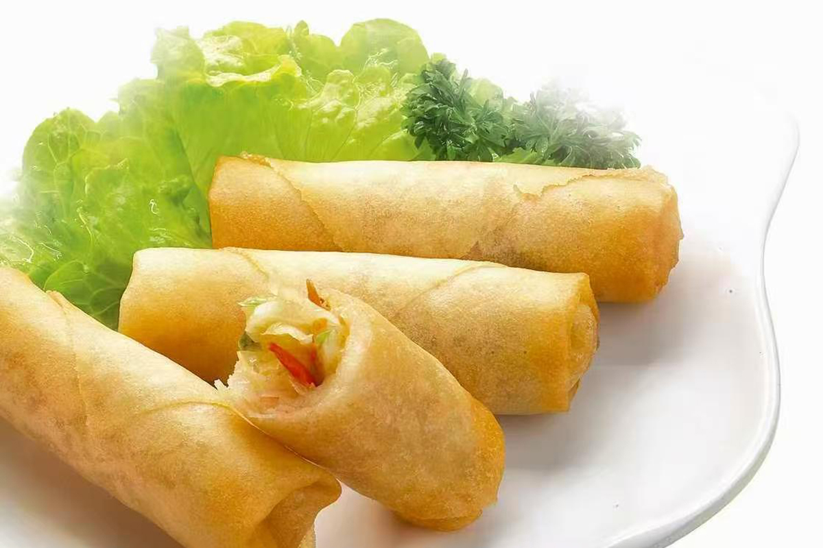 Golden fried spring rolls with visible vegetable filling at New China Two，a Chinese Restaurant in Redding