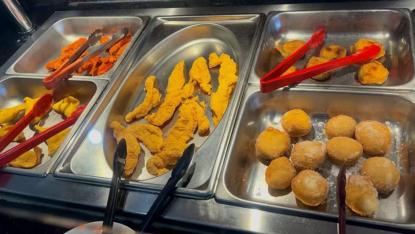 Fried fish and sweet desserts at New China Buffet Restaurant in Huntingdon