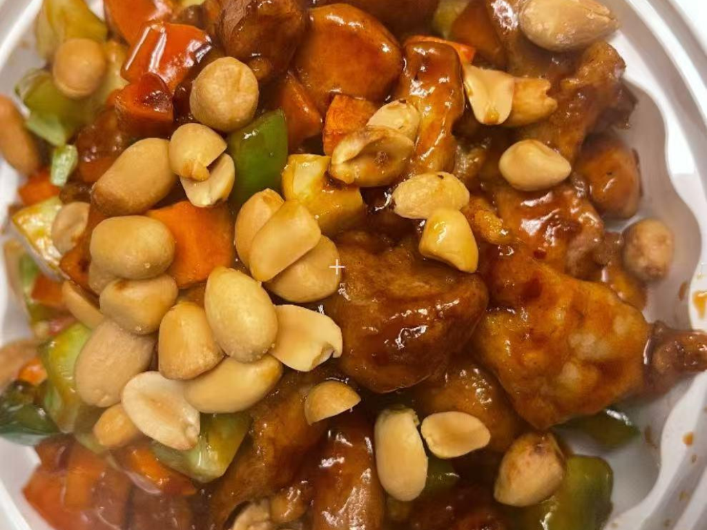 Savory Kung Pao chicken with peanuts and colorful peppers at New China City, a Chinese Restaurant in Roanoke