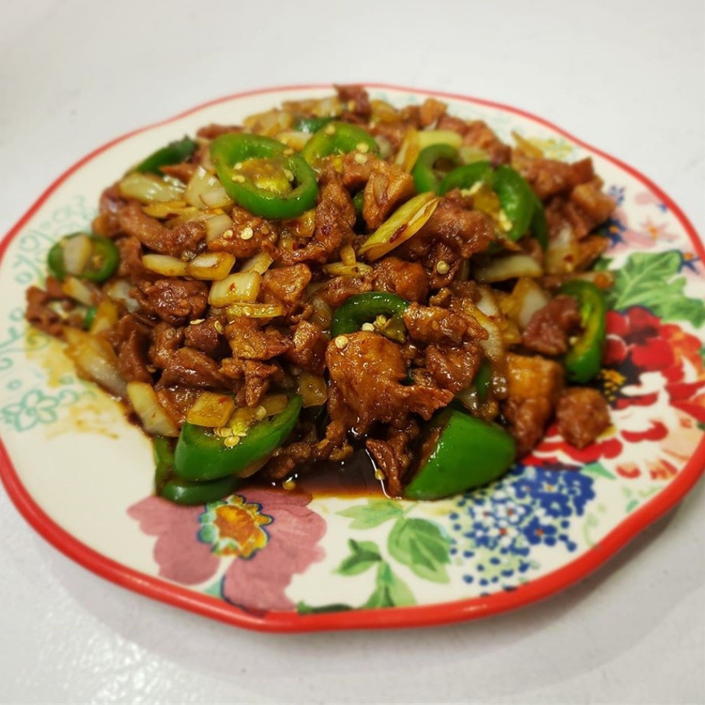 Savory spicy pork stir-fried with green peppers at New China King, a Chinese Restaurant in Ardmore