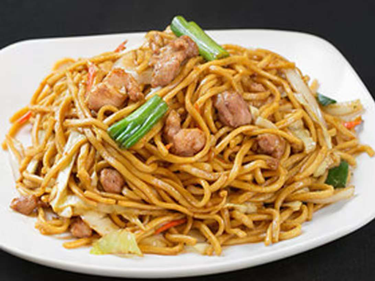 A plate of savory lo mein noodles with vegetables and meat at New China Restaurant，a Chinese Restaurant in Lawrenceville