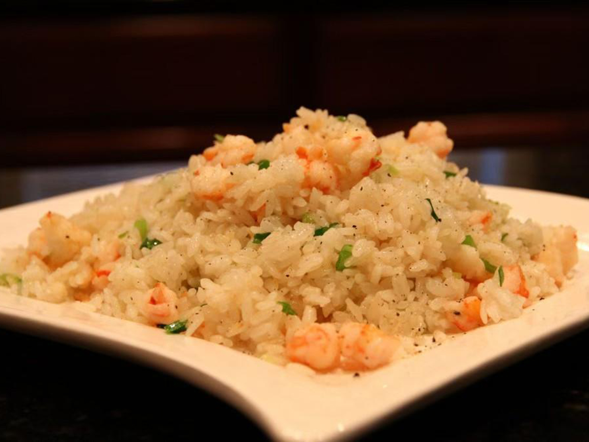 Flavorful fried rice mixed with succulent shrimp and vegetables at New China Restaurant，a Chinese Restaurant in Lawrenceville