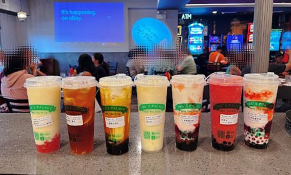 Assorted colorful bubble tea drinks on counter at New Ing's Palace, a Asian Restaurant in Burbank