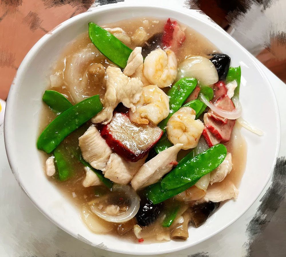 Chicken and shrimp stir-fry with snow peas at New Ing's Palace, a Asian Restaurant in Burbank