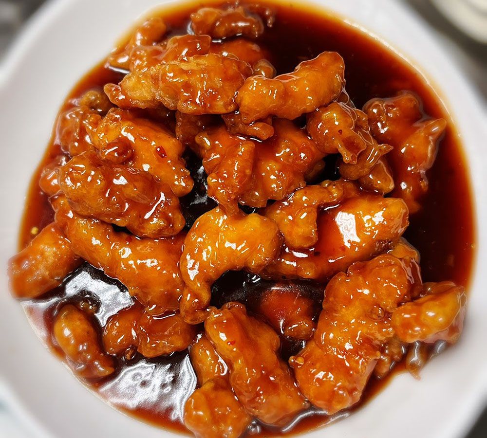 Crispy chicken coated with sweet sour sauce at New Ing's Palace, a Asian Restaurant in Burbank