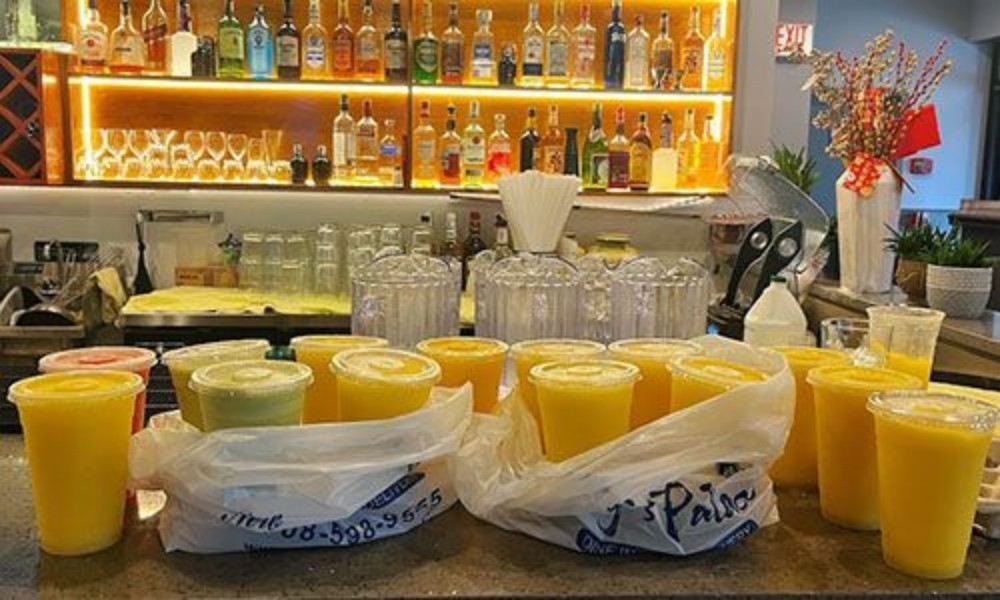 Multiple fresh fruit smoothies on bar counter at New Ing's Palace, a Asian Restaurant in Burbank