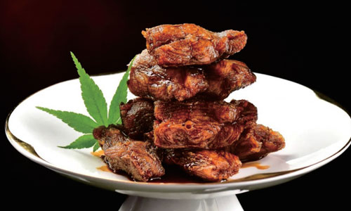 Braised beef pieces on a pedestal plate at New Shanghai No. 1, a Chinese restaurant in San Gabriel