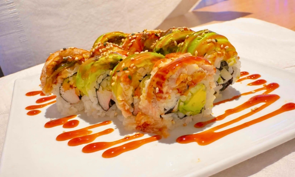 Dragon roll with avocado, eel, and spicy sauce at New Tokyo & Ichiban Japanese Grill, a Japanese Restaurant in Tupelo