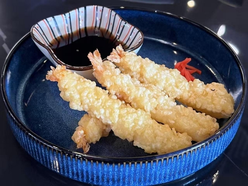 Crispy shrimp tempura served with soy sauce at Ninja Ramen, a Japanese Restaurant in Englewood