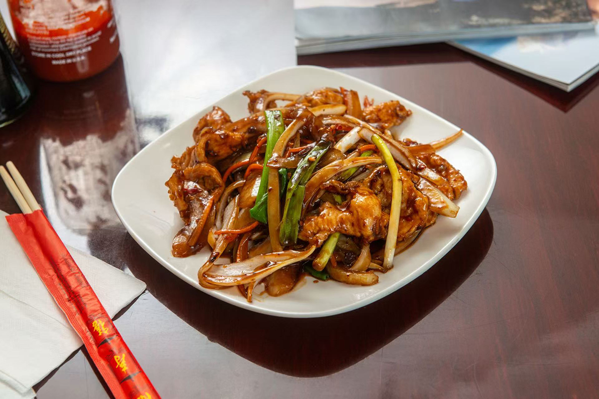 NO.1-Acian-Cuisine-Asian-Restaurant-Mongolian-Chicken-Morristown Stir - fried noodles with vegetables and meat on a white plate at NO.1 Acian Cuisine,a Asian Restaurant in Morristown