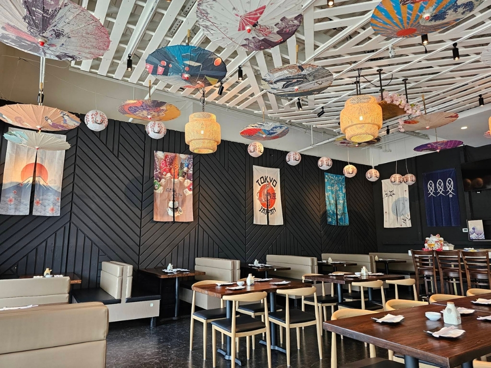 Bright Nobu Sushi restaurant interior with umbrellas and lanterns at Nobu Sushi, an Sushi Restaurant in South Elgin.