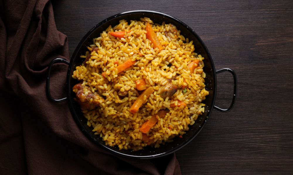 One-pot rice dish with carrots, meat, and aromatic spices at Noodle House, a Japanese Sushi Restaurant in Flemington