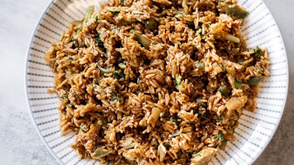 Flavorful fried rice with mixed vegetables and green onions at Noodle Man , a Noodle shop in Virginia Beach