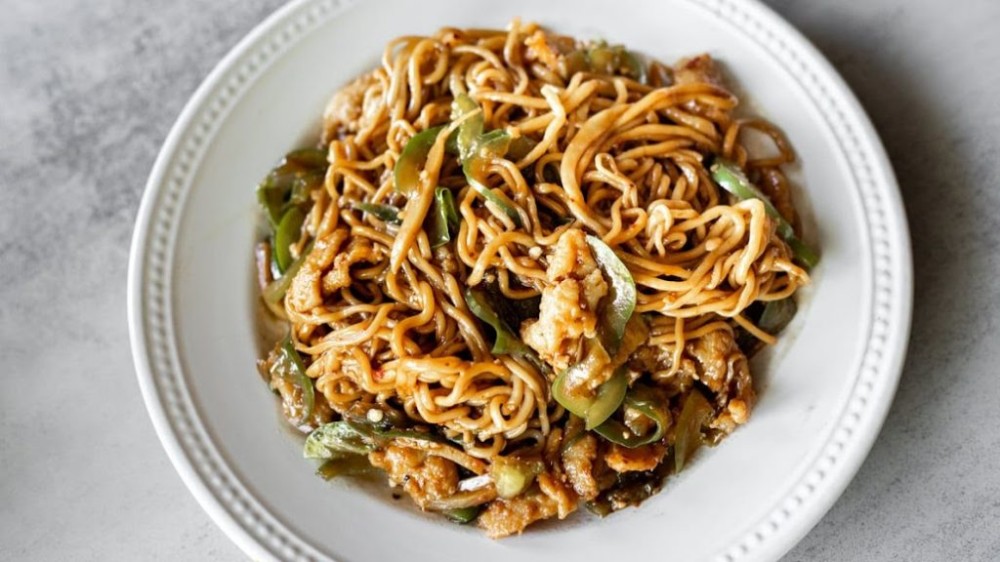 Savory stir-fried noodles with vegetables and eggs at Noodle Man , a Noodle shop in Virginia Beach