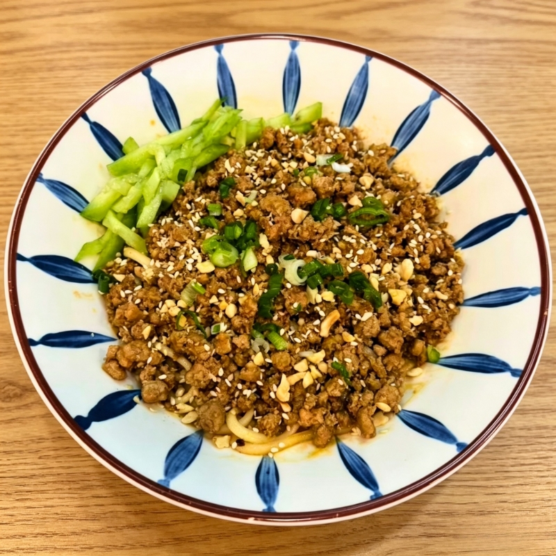 Minced pork dry noodle with cucumber at Noodle・ology, a Asian Restaurant in Edmond Minced pork dry noodle with cucumber at Noodle・ology, a Asian Restaurant in Edmond