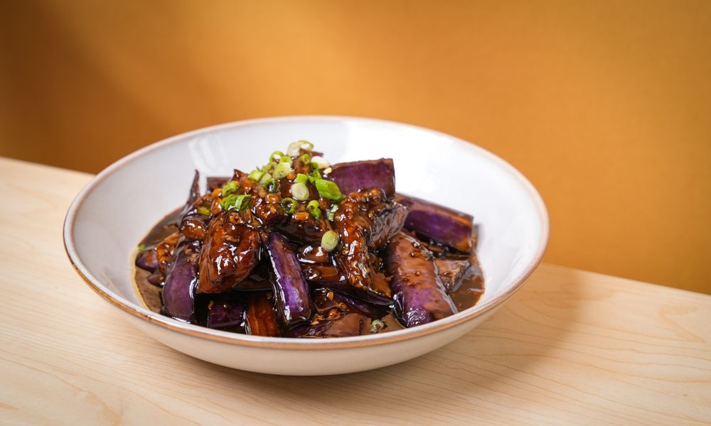 Glossy eggplant braised in savory soy-based sauce at Noodle One, a Halal Restaurant in Frisco
