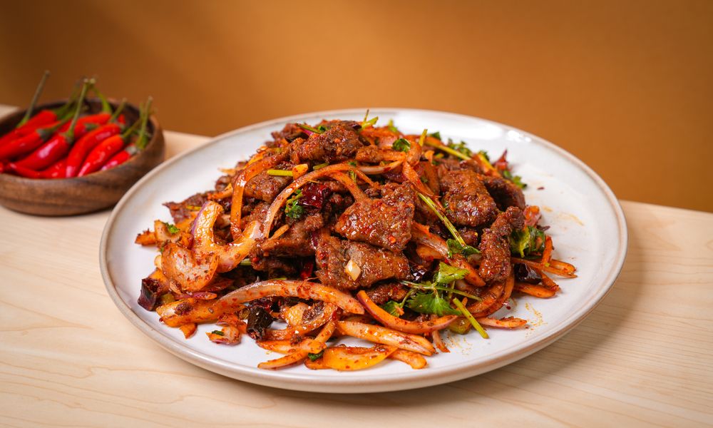 Spicy stir-fried beef with onions & herbs at Noodle One, a Halal Restaurant in Frisco